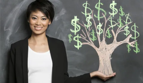 woman next to a money tree