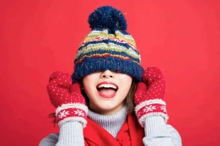 woman in hat and gloves